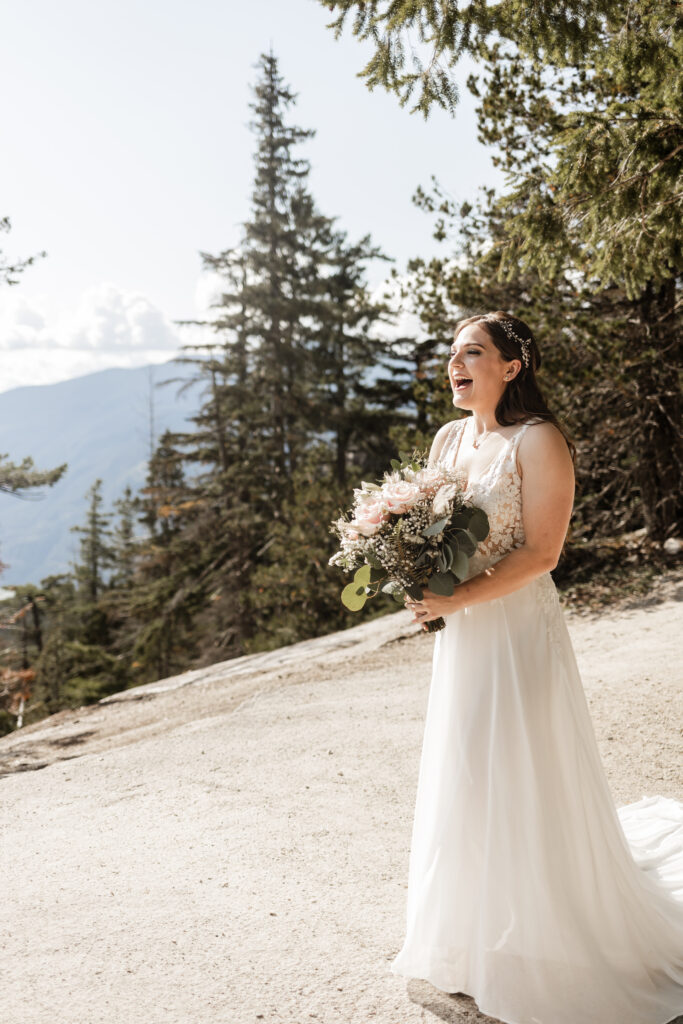 Kat smiles at Melissa at this Sea to Sky Gondola wedding