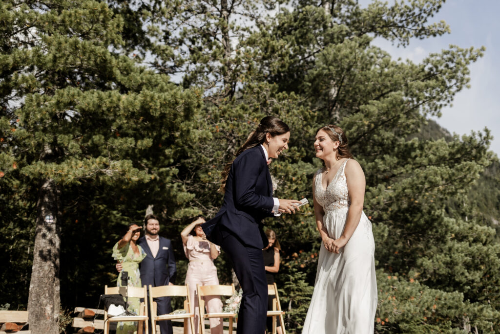 The couple share a laugh during vows at this Sea to Sky Gondola wedding