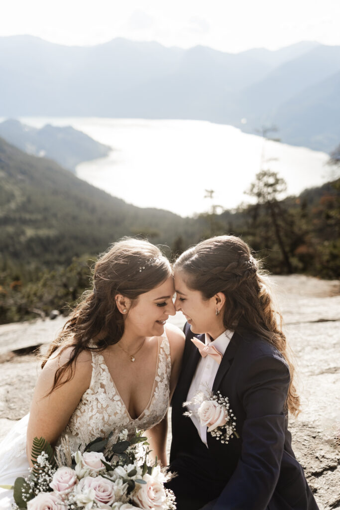 The couple touch their foreheads together at this Sea to Sky Gondola wedding