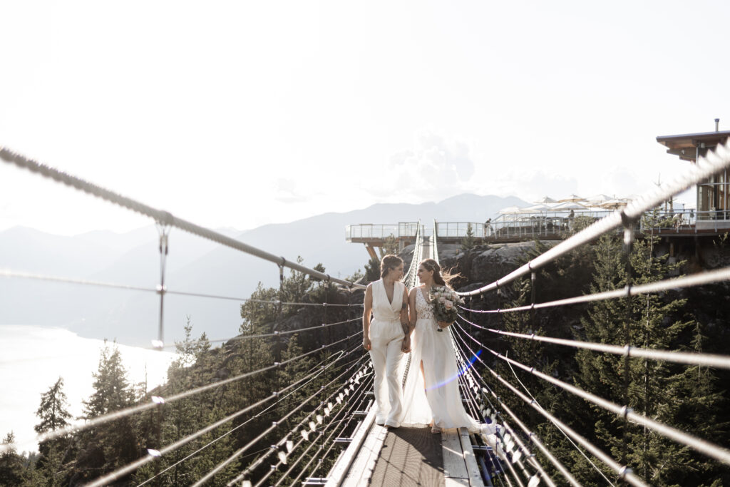 The couple walk down the suspension bridge at this Sea to Sky Gondola wedding