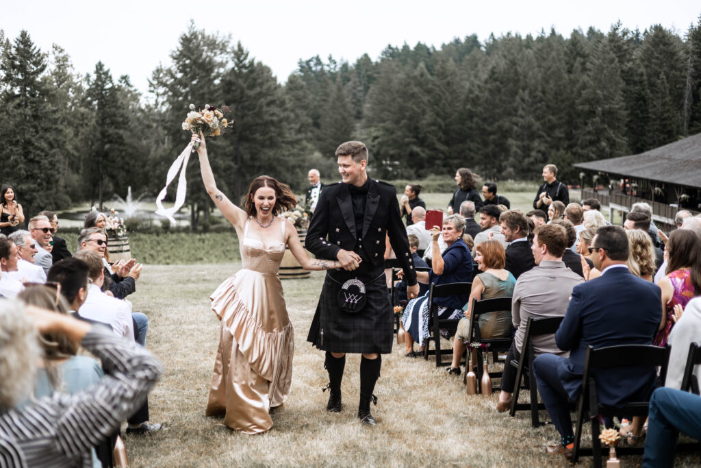 Bride and groom dance back down the aisle at this Church and State Winery wedding