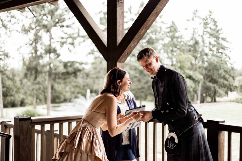 Bride and groom laugh during their legal ceremony at this Church and State Winery wedding