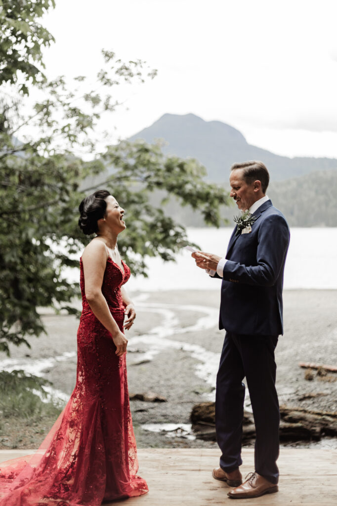 The couples exchange vows at their Gibsons Island summer camp wedding at Camp Elphinstone