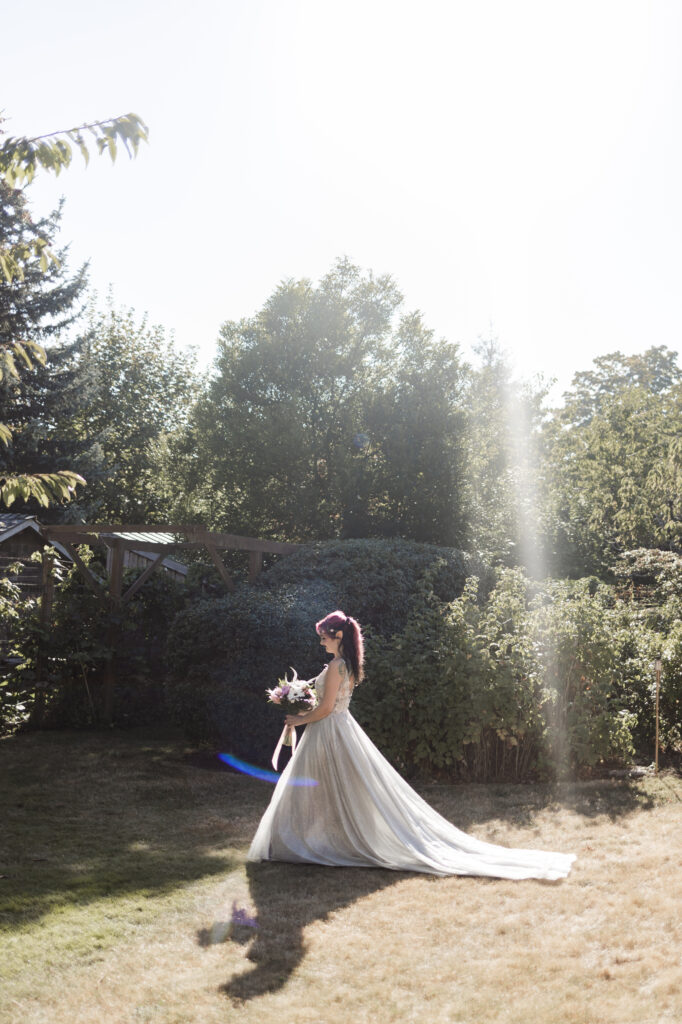 Bride walks down the aisle in sparkly dress and faerie ears at this Vancouver Island costume wedding