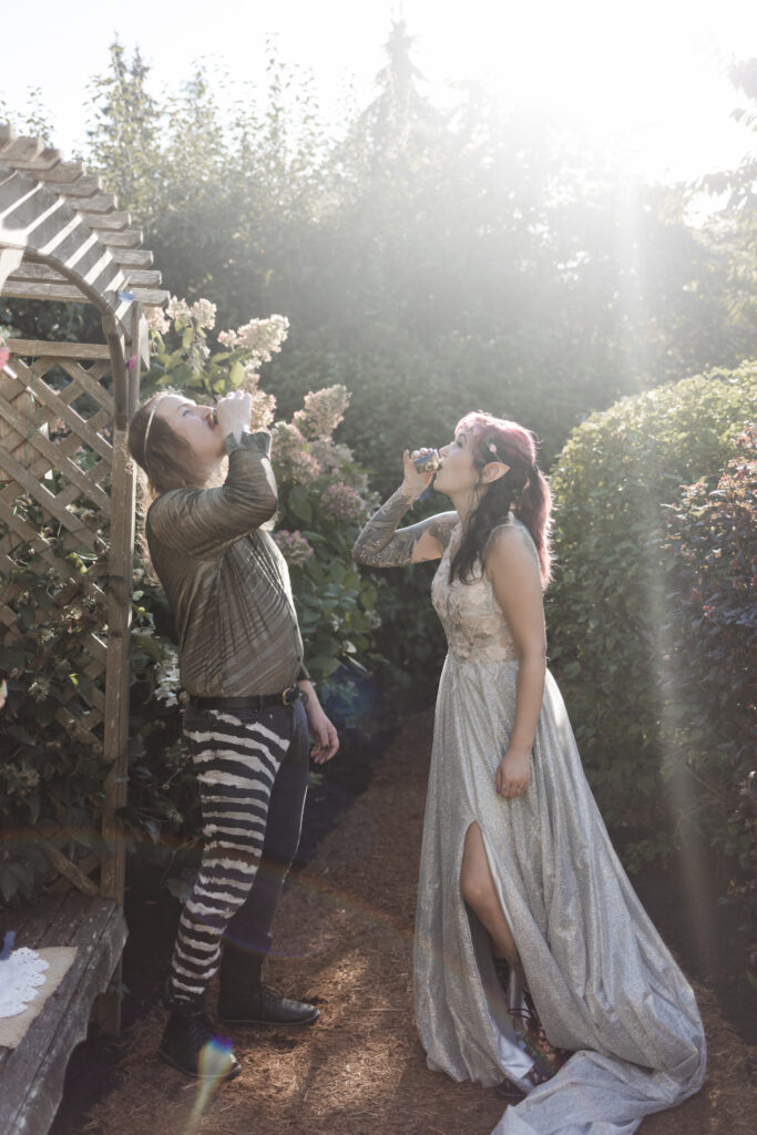 Bride and groom take a shot together at this Vancouver Island costume wedding