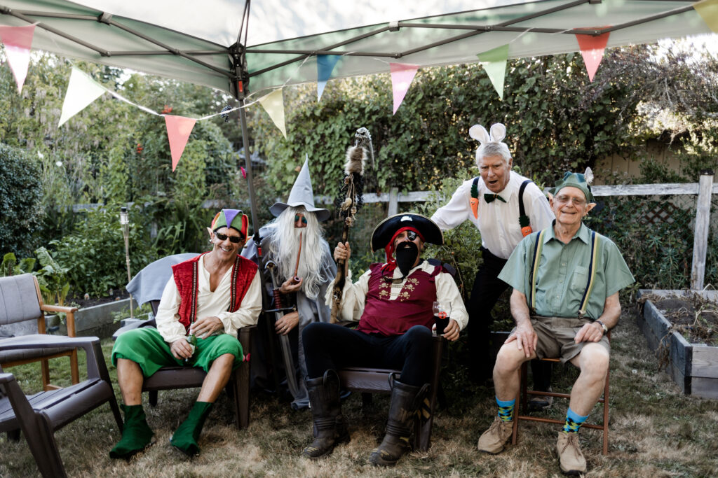 A group of guests all dressed in various costumes at this Vancouver Island costume wedding