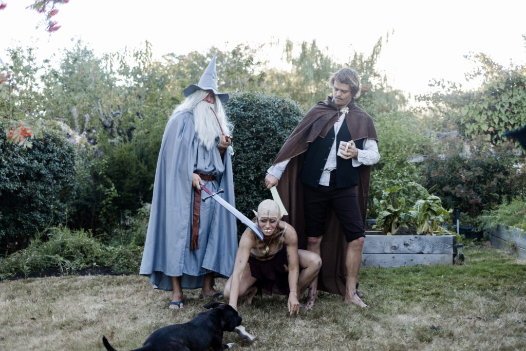 Guests dressed as Gollum, Gandalf, and Frodo at this Vancouver Island costume wedding