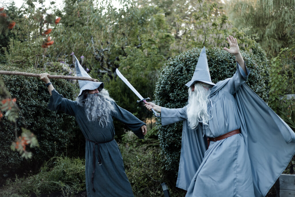 Two guests dressed as Gandalf square off at this Vancouver Island costume wedding