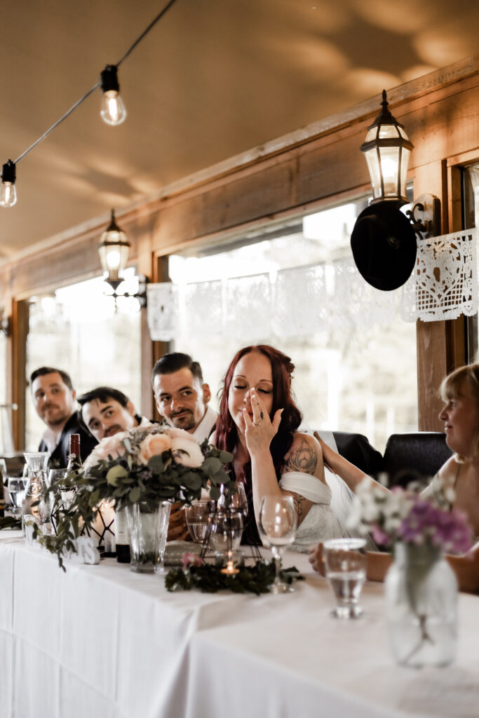 bride cries during speeches at this Cobble Hill Winery wedding