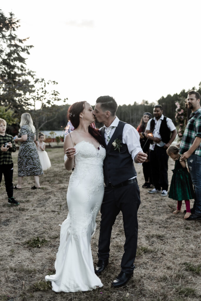 bride and groom have a sparkler exit at this Cobble Hill Winery wedding