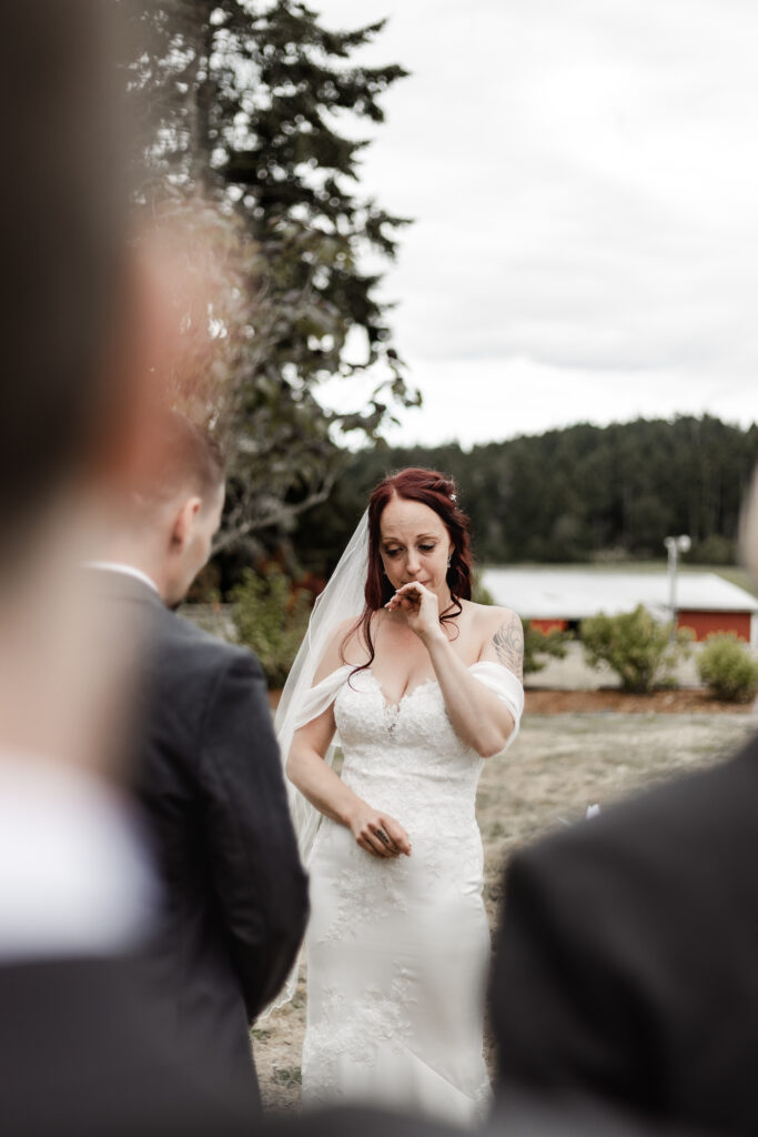 bride crying at the altar at this Cobble Hill Winery wedding