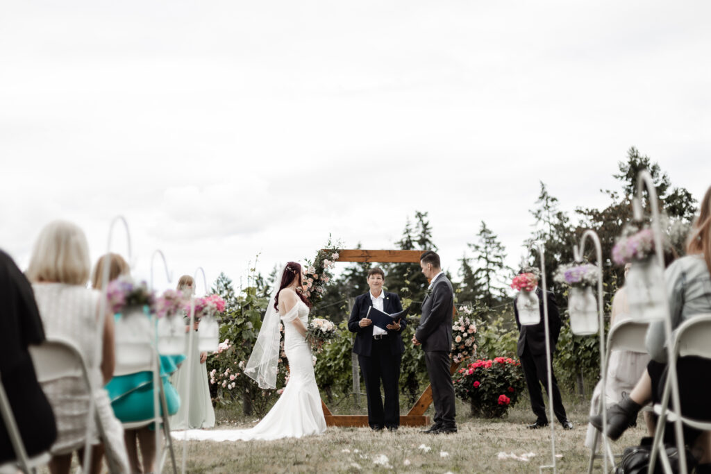 bride and groom standing at the altar at this Cobble Hill Winery wedding