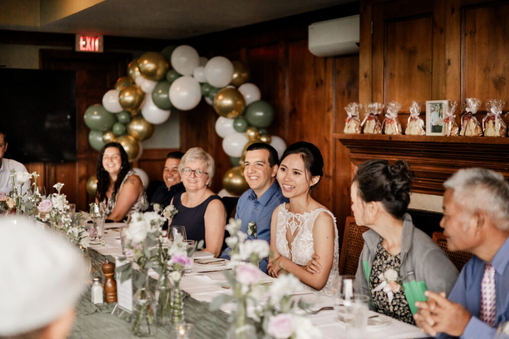 Bride and groom at their Seasons in the Park reception at this Bloedel Conservatory wedding 