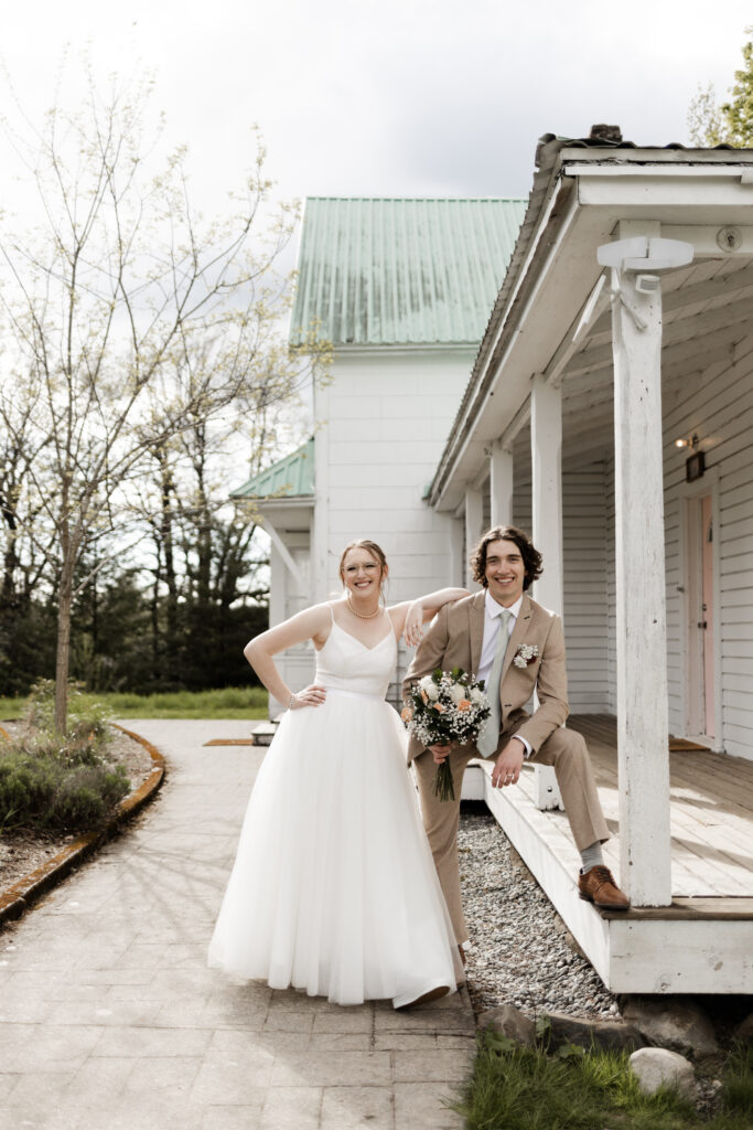 The bride and groom pose outside of the bridal suite at this Estate 248 wedding in Langley, British Columbia