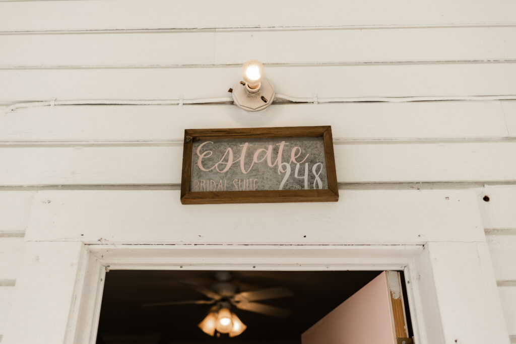 Signage outside of the bridal suite saying "Estate 248 bridal suite" at an Estate 248 wedding in Langley, British Columbia