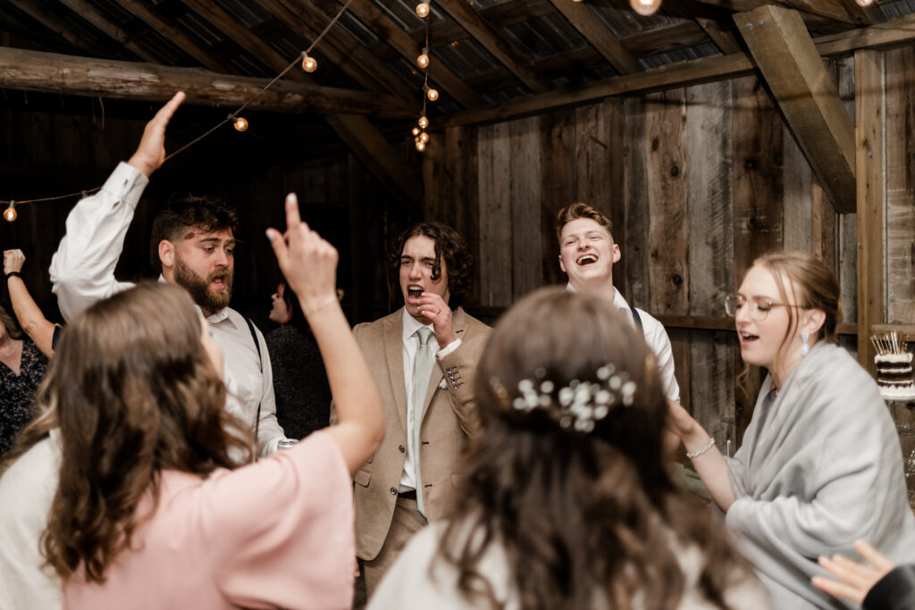 bride and groom dancing with their friends during their reception at this Estate 248 wedding in Langley, British Columbia