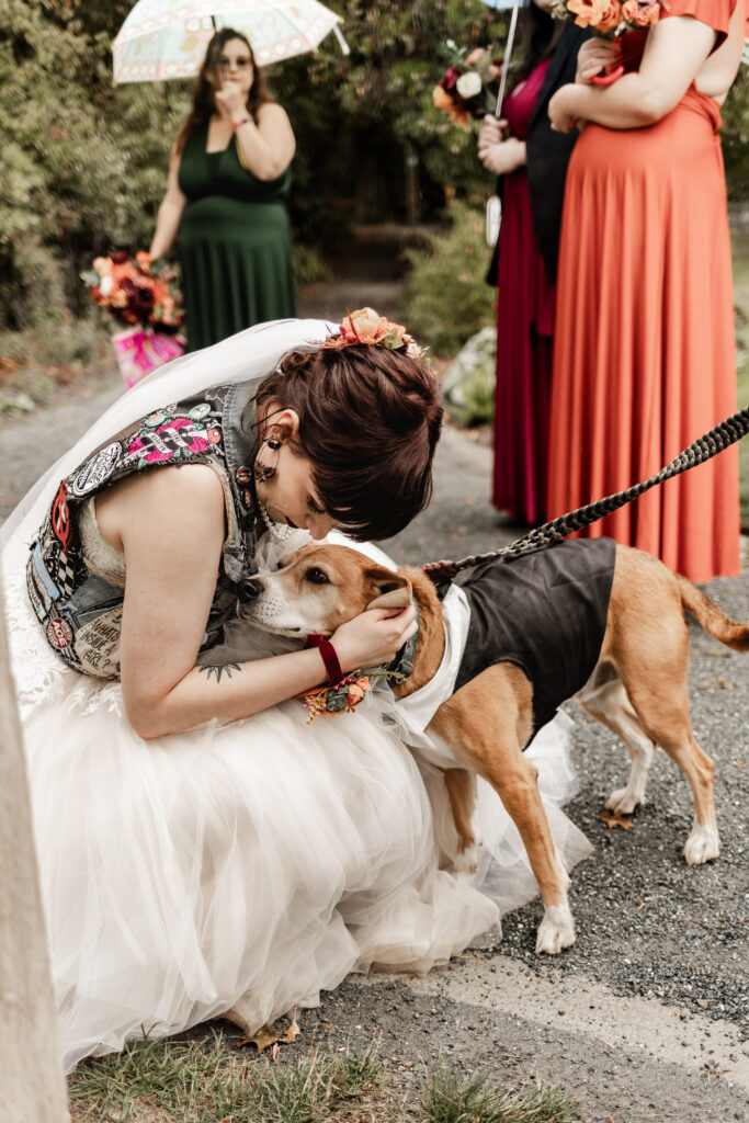 bride snuggles her dog at this punk wedding in Victoria, BC