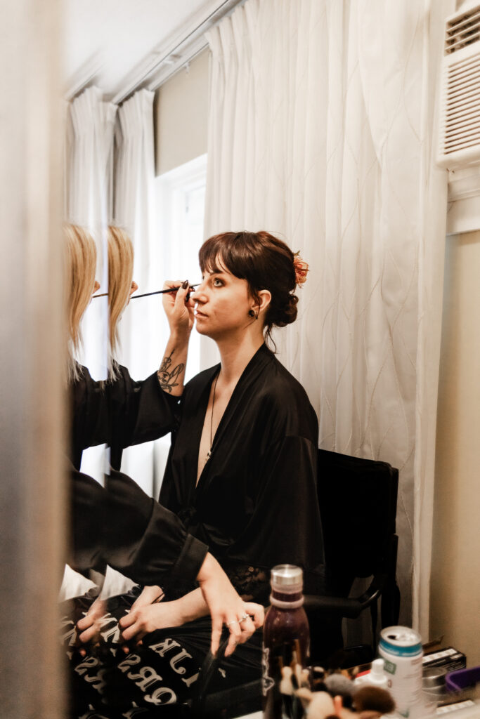 Bride gets her makeup done for her punk wedding in Victoria, BC