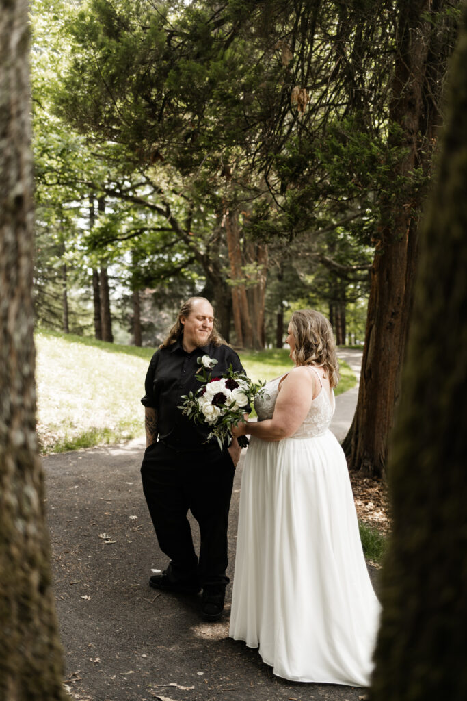 Bride and groom have a first look at their backyard wedding in Mission