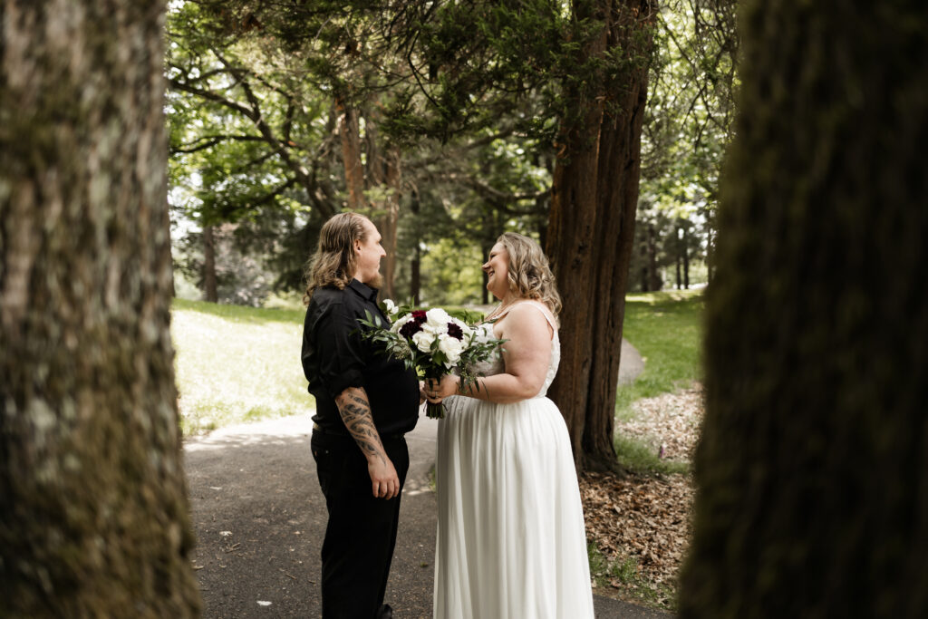 Bride and groom have a first look at their backyard wedding in Mission