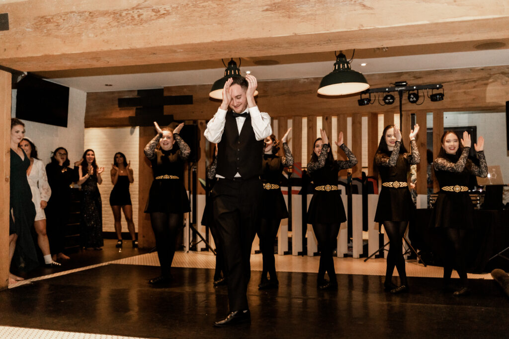 Groom partakes in Irish dance at Loft at Earls at this downtown Vancouver wedding