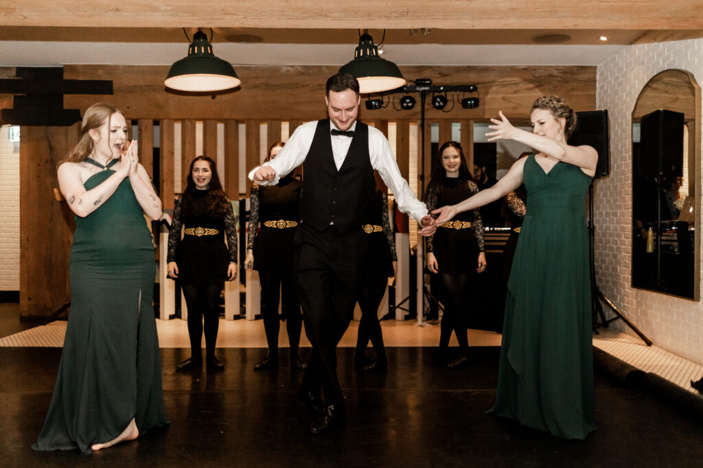 Groom partakes in Irish dance at Loft at Earls at this downtown Vancouver wedding