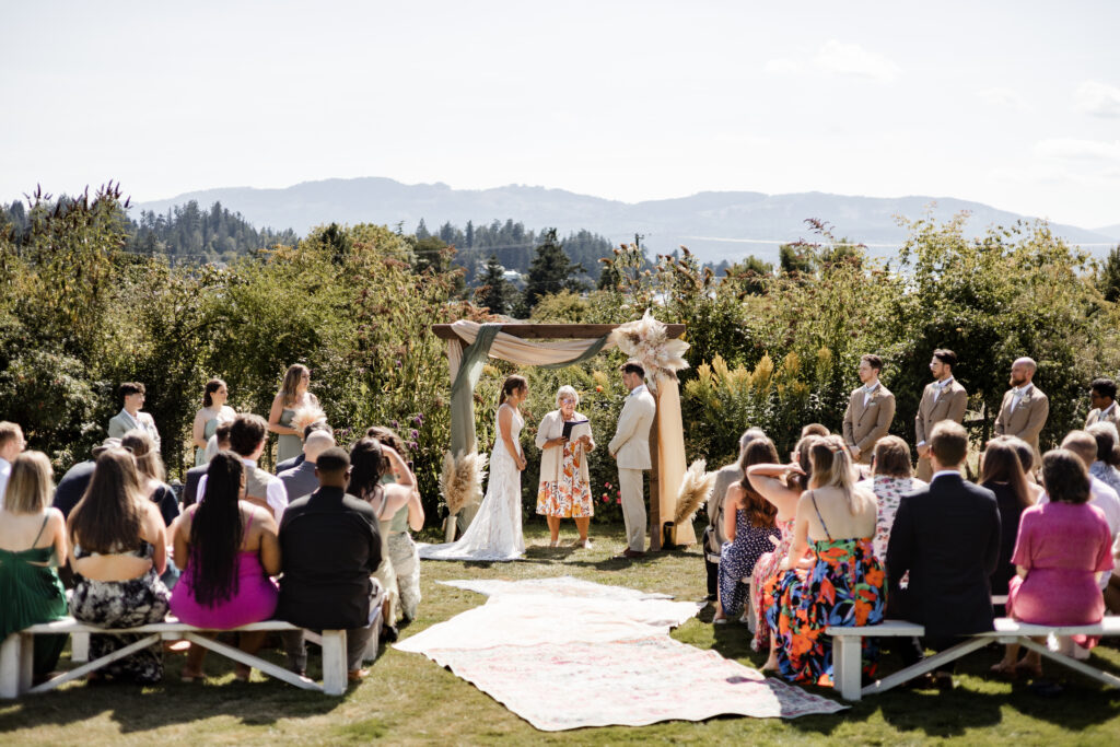 The bride and groom stand at the altar at this Kildara Farms wedding