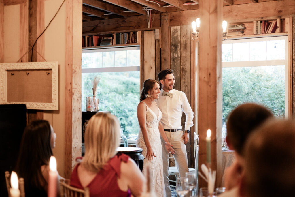 The bride and groom give a thank you speech to their guests at this Kildara Farms wedding