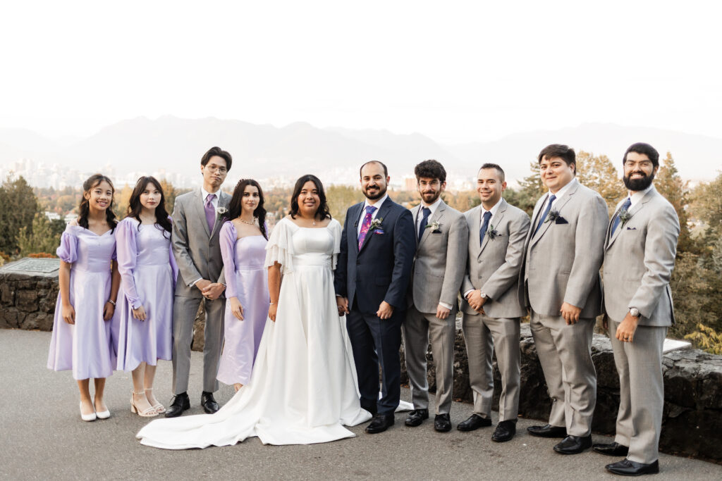 Bridal party poses at this wedding at Seasons Restaurant