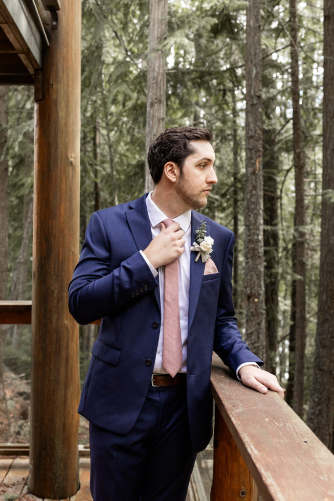 Groom solo portraits before the ceremony at his Mabel Lake elopement