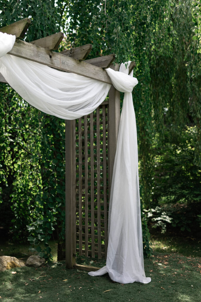Up close of the altar in the ceremony space at the Secret Garden at Ripples Winery, a wedding venue in Abbotsford, BC.