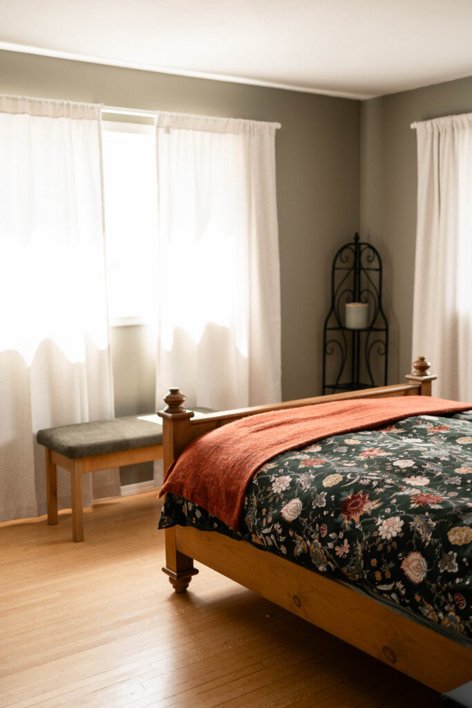 Bedroom decor in a room at the Bed and Breakfast at the Secret Garden at Ripples Winery, a wedding venue in Abbotsford, BC.
