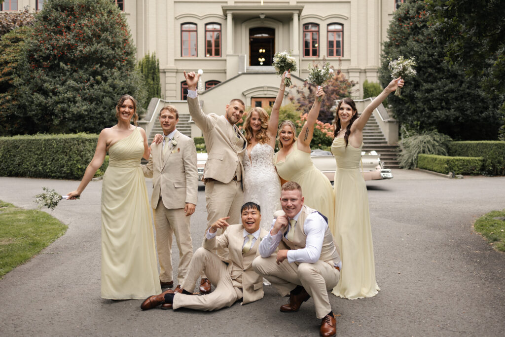 Bridal party cheers in celebration at this Victoria cathedral wedding