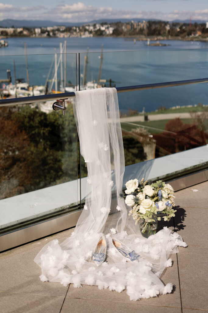 Elegant bridal details captured at a Laurel Point Inn wedding overlooking the w