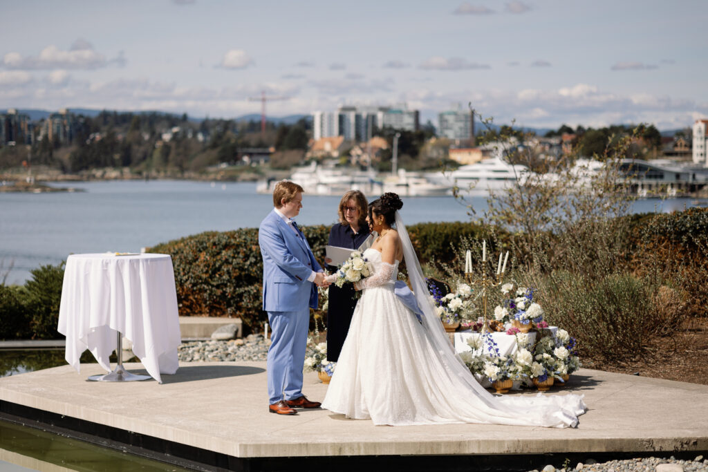 Intimate ceremony on the water at Laurel Point Inn wedding in Victoria