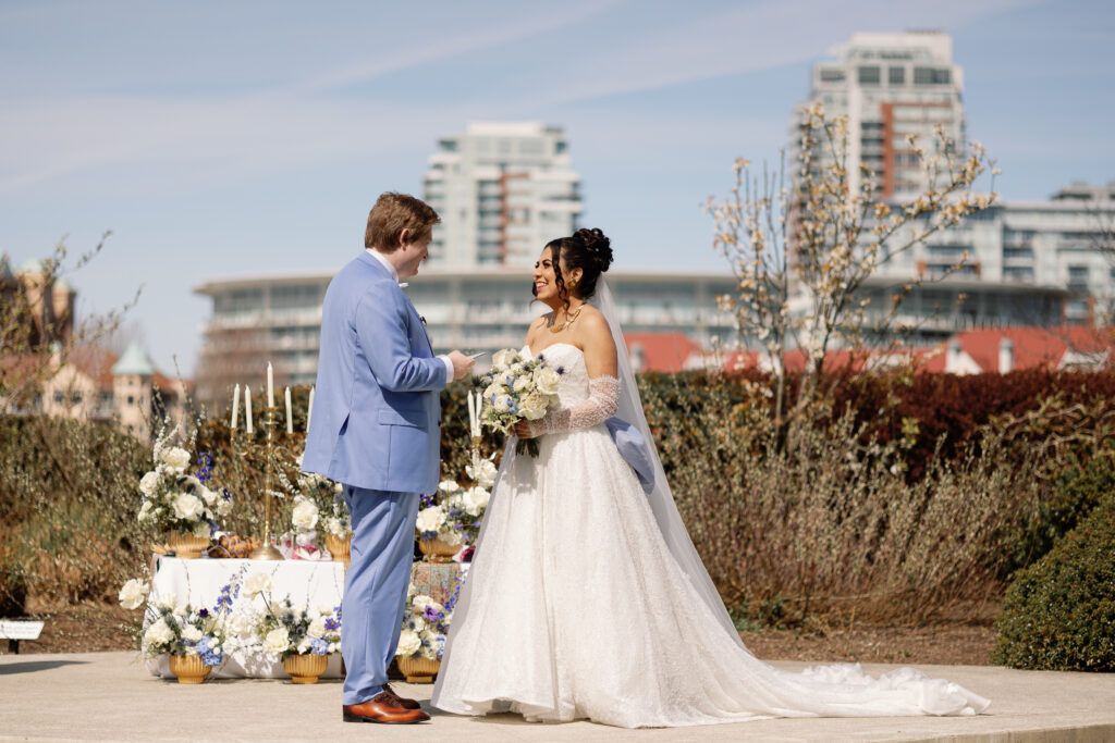 Candid reaction during a Laurel Point Inn wedding ceremony by the ocean