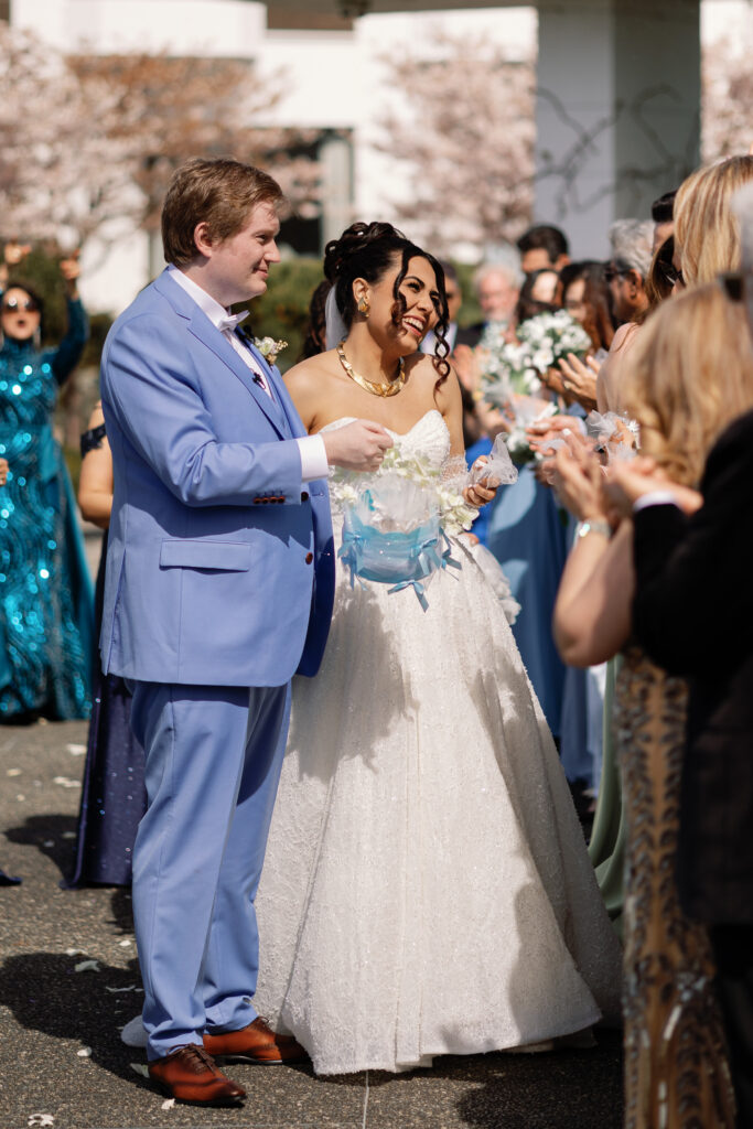 Joyful celebration and energy during Laurel Point Inn wedding ceremony