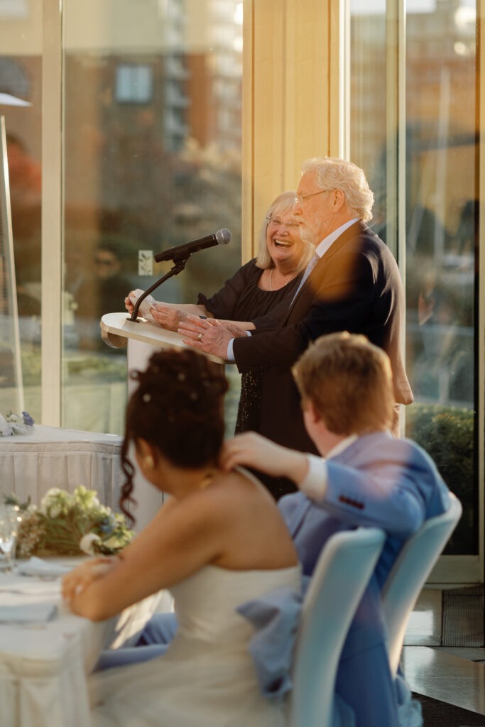 Emotional speeches during a Laurel Point Inn wedding reception