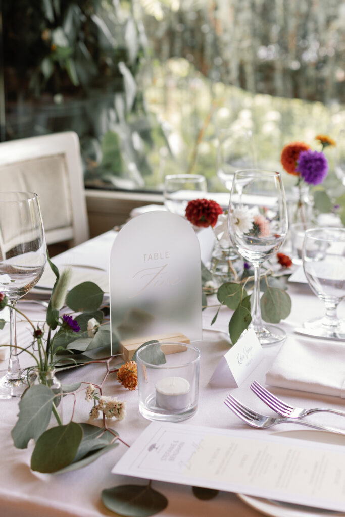 Shaughnessy Restaurant wedding reception with soft natural light and romantic table settings in Vancouver