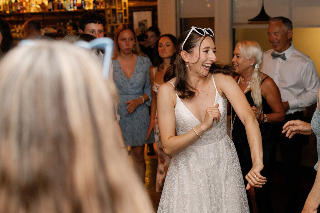 Joyful celebration during a Shaughnessy wedding reception with expressive family moments